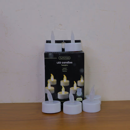 Six Wukusy LED flameless tealight candles for home decor, showing warm flickering lights in a cozy setting.