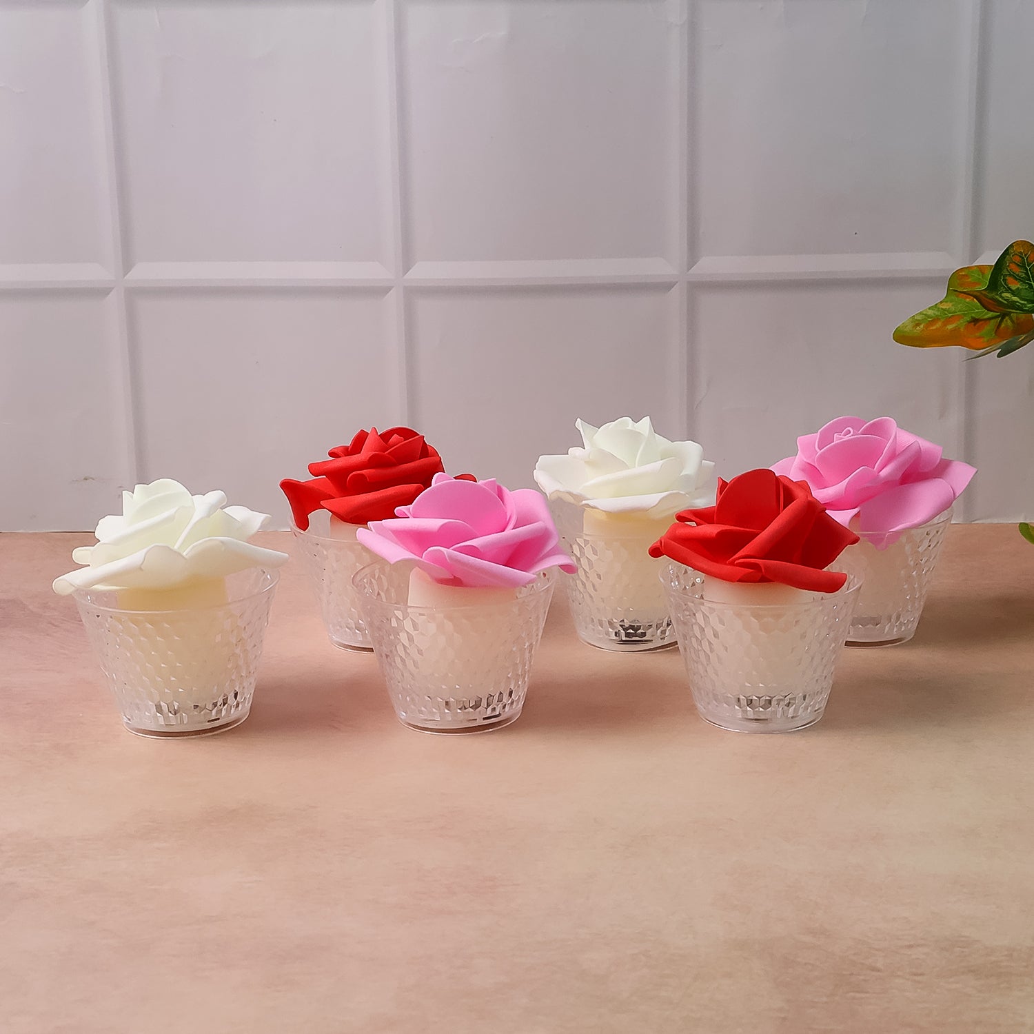 Set of six Wukusy LED rose flower flameless tealight candles for home decor, featuring realistic rose designs and warm ambient lighting.