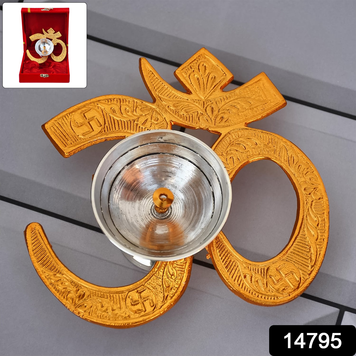 Brass Om symbol oil diya for home decor, featuring a traditional design with a lit oil wick and intricate detailing.