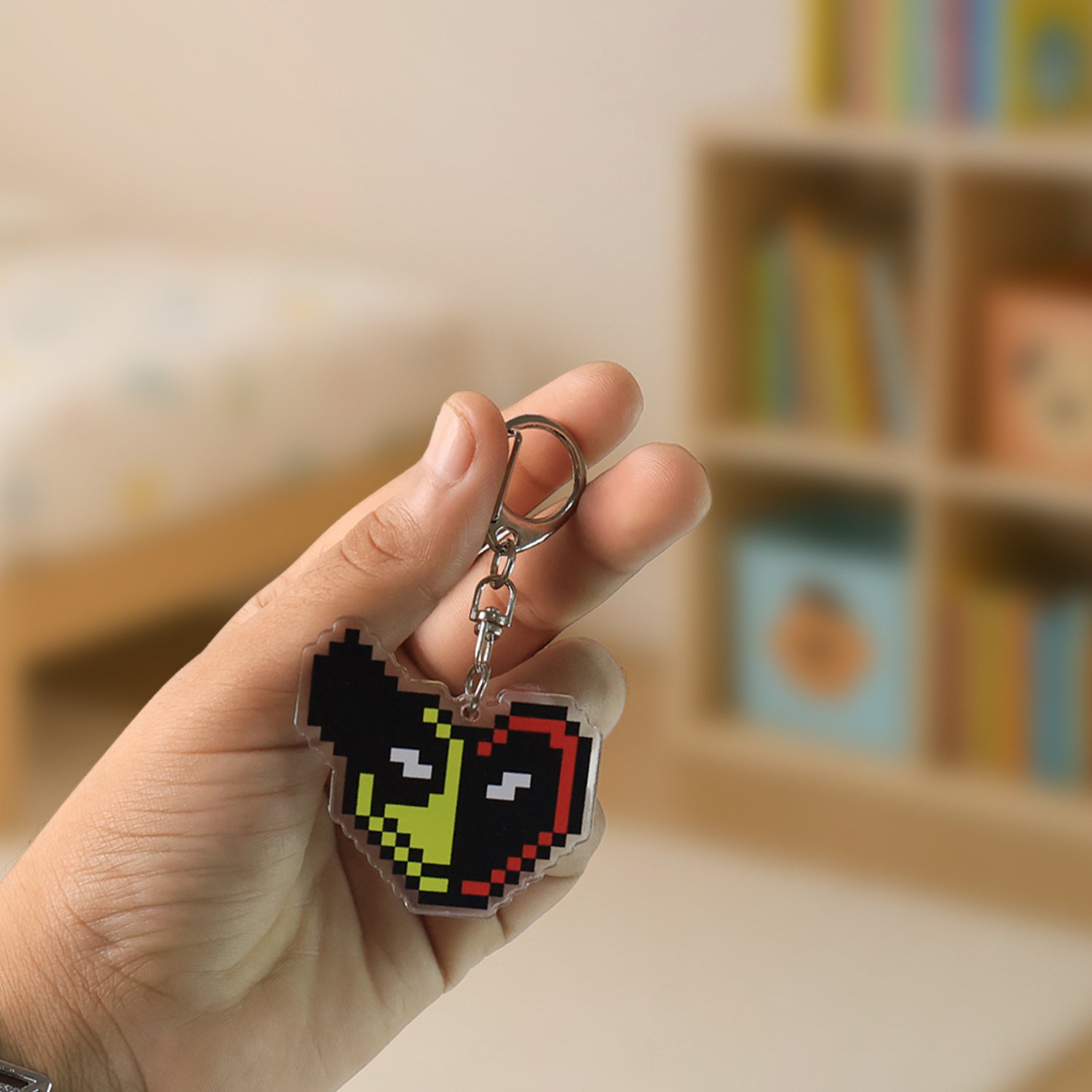 Pixel style acrylic cartoon keychain with a funky design, featuring vibrant colors and fun character details for home decor.