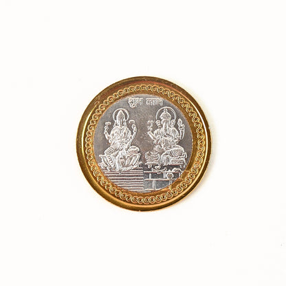 Dual-tone gold and silver religious coin featuring Lakshmi and Ganesh design, ideal for home decor from Wukusy.