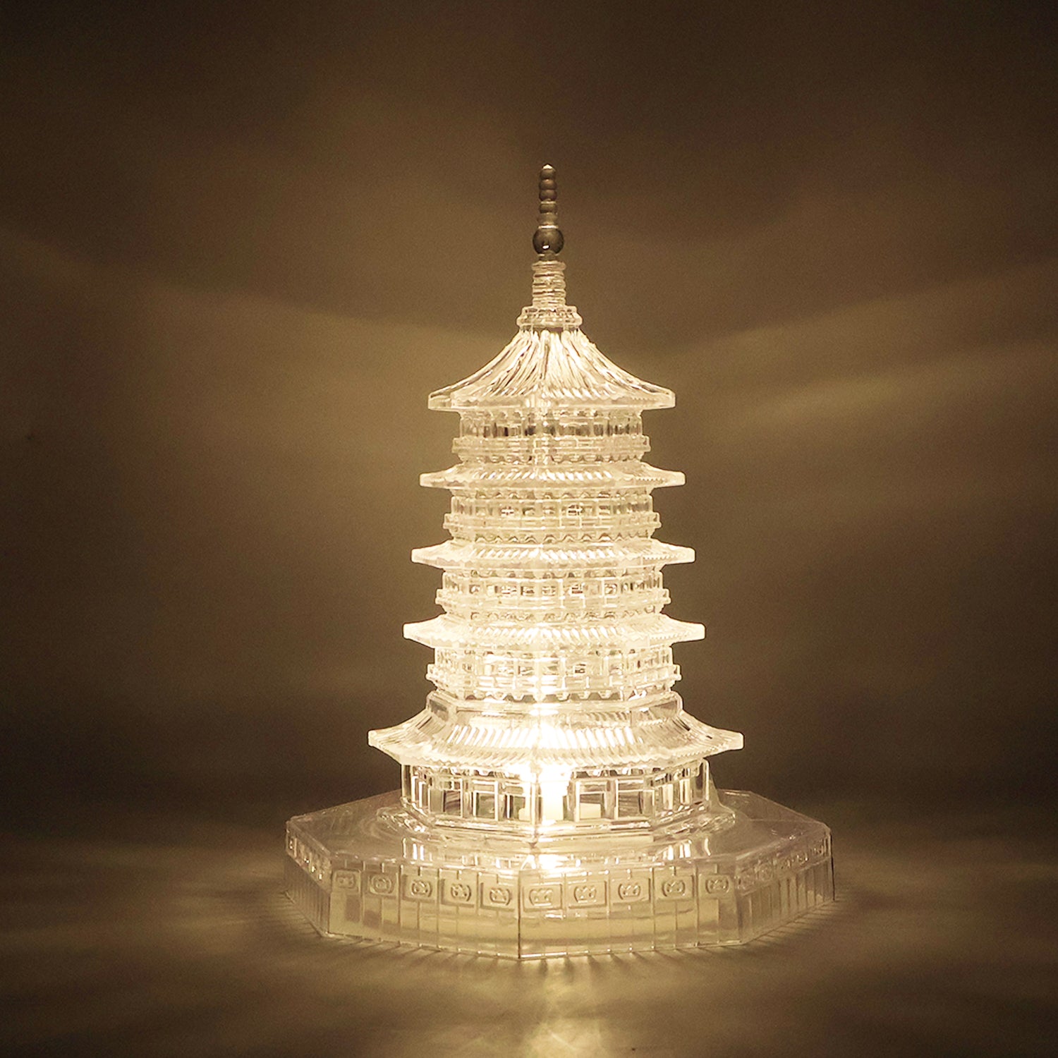 Wukusy premium LED crystal pagoda decorative light for home decor, illuminated display with intricate design, single piece.