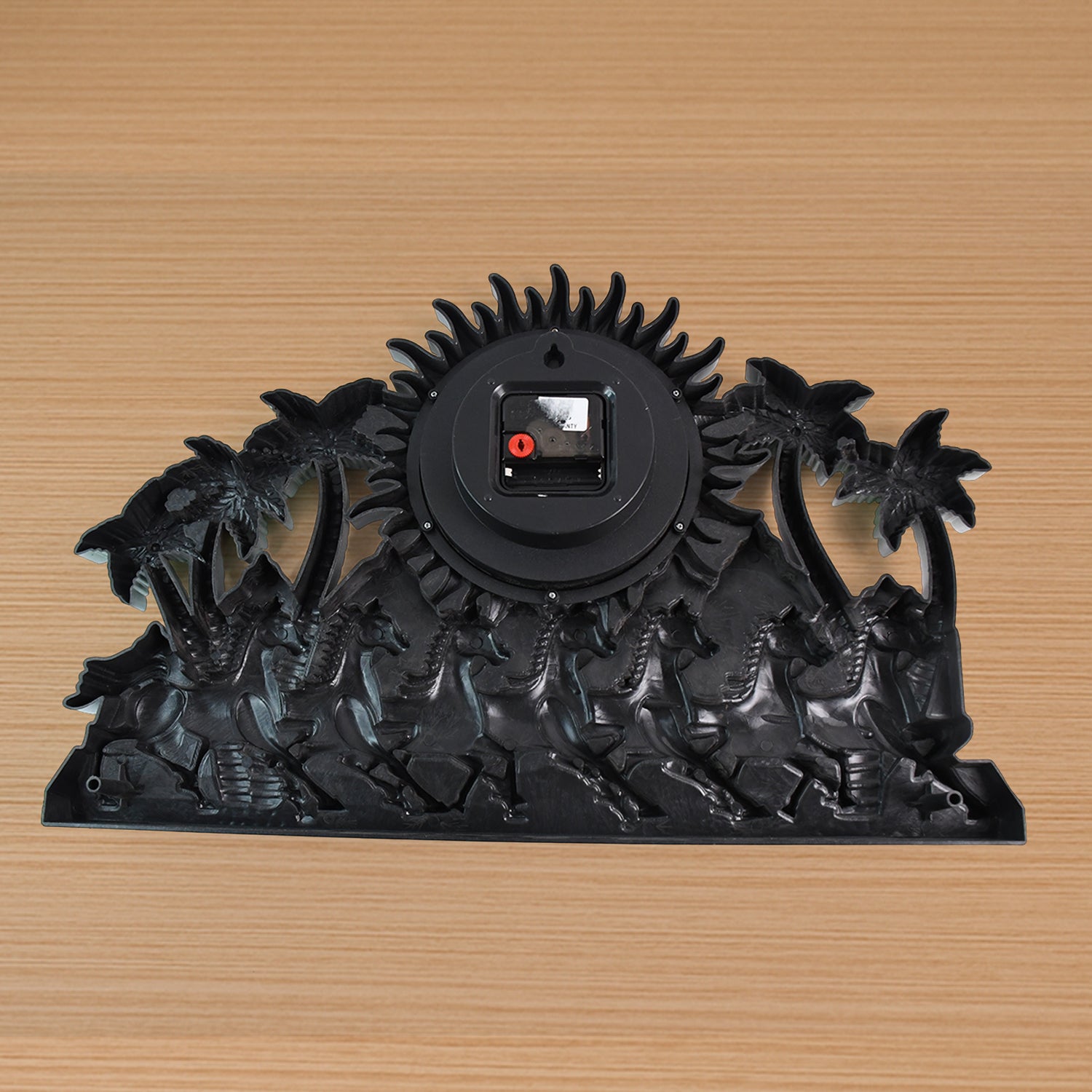 Wukusy premium plastic body wall clock for home decor, round design with black and white face, hanging on a modern wall.