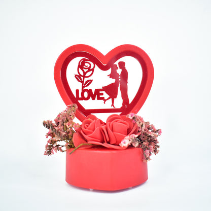 Romantic heart-shaped love couple decorative showpiece with rose base, ideal for home decor from Wukusy.