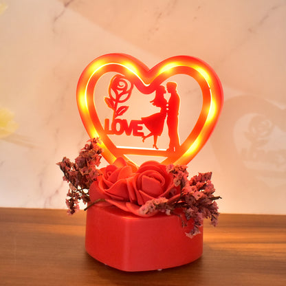 Romantic heart-shaped love couple decorative showpiece with rose base, perfect for home decor, by Wukusy.