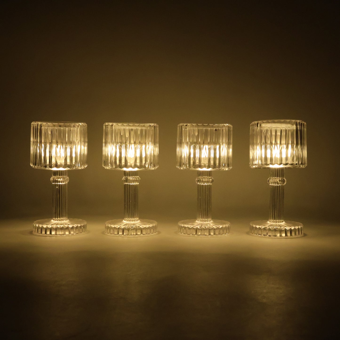 Set of 4 Wukusy LED crystal-effect table lamps for home decor, featuring elegant transparent design and ambient lighting.