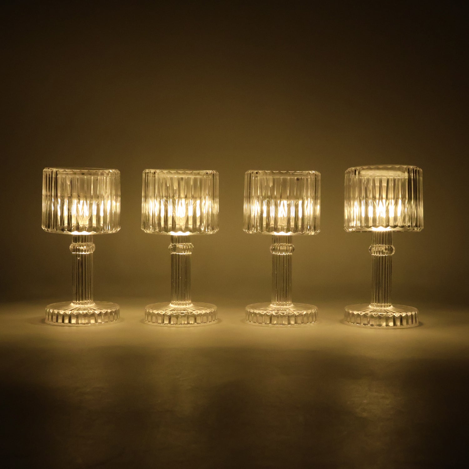 Set of 4 Wukusy LED crystal-effect table lamps for home decor, featuring elegant transparent design and ambient lighting.