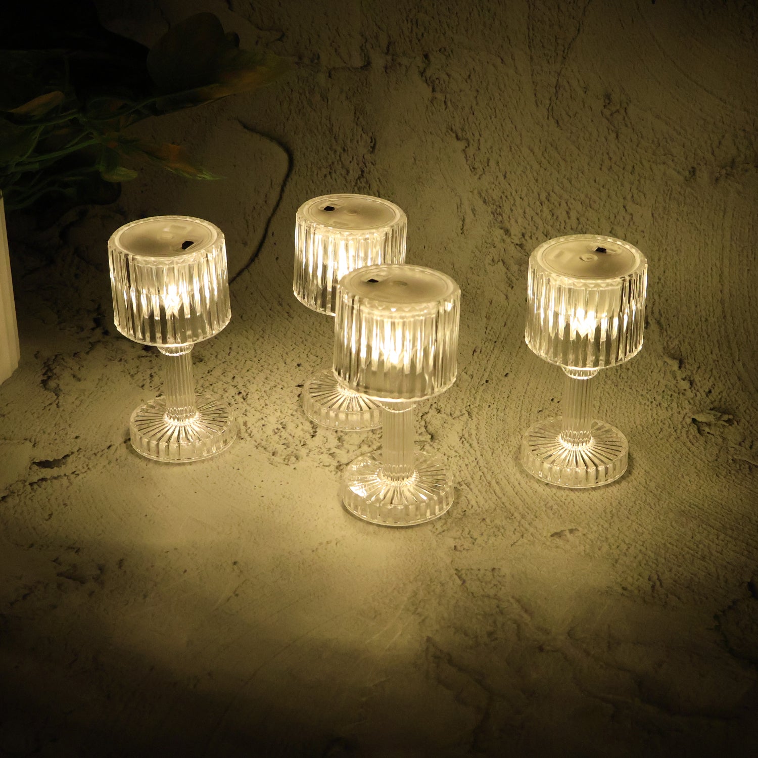 Set of 4 Wukusy LED crystal-effect table lamps for home decor, featuring transparent bases and elegant lighting.