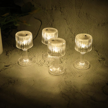 Set of 4 Wukusy LED crystal-effect table lamps for home decor, featuring transparent bases and elegant lighting.