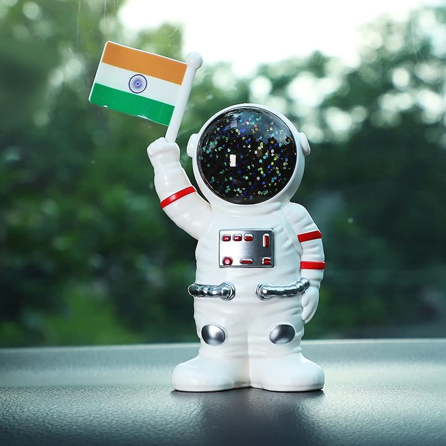 Wukusy solar-powered astronaut ornament with Indian flag, features a moving hand, ideal for space-themed home decor.