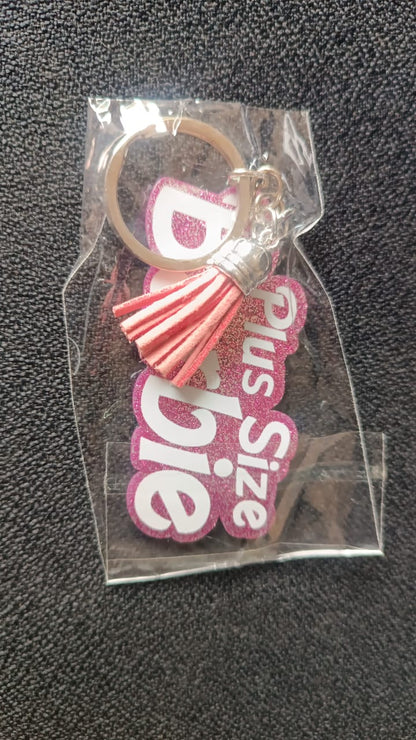 Wukusy home decor text keychain with glitter finish and tassel charm, featuring a stylish and decorative accessory.
