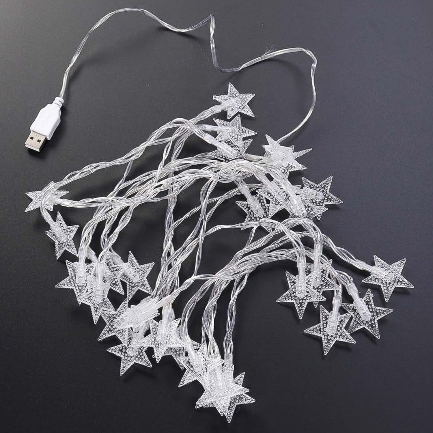 Wukusy USB-powered 20 LED decorative star string fairy lights for home decor, glowing with warm light on a white background.