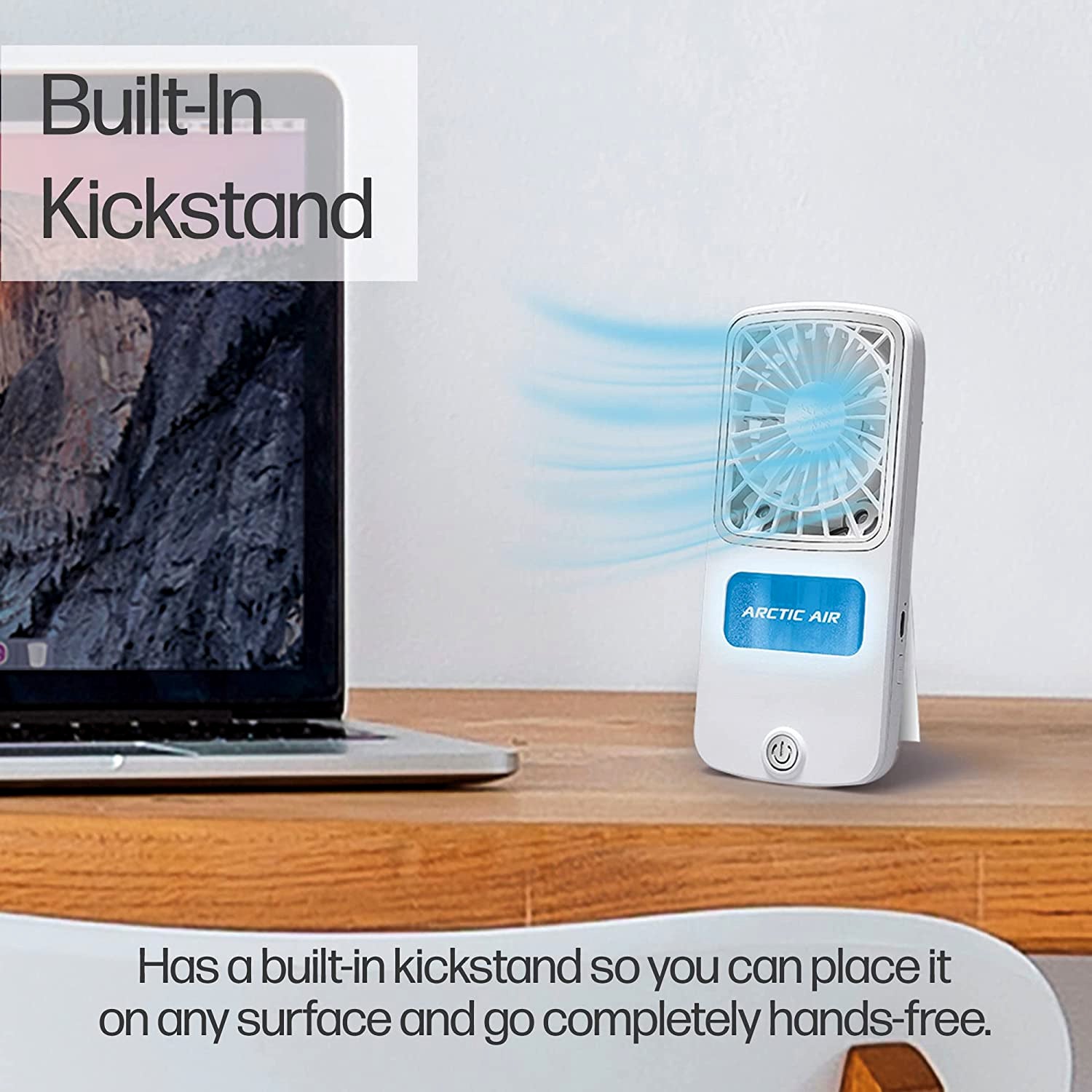 Wukusy Arctic Air Freedom portable personal air cooler on a home desk, compact design with adjustable vents for cooling.