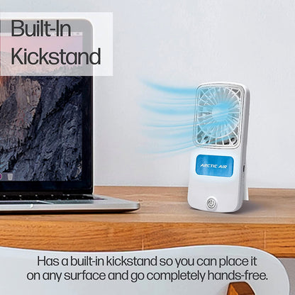 Wukusy Arctic Air Freedom portable personal air cooler on a home desk, compact design with adjustable vents for cooling.