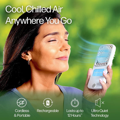 Wukusy Arctic Air Freedom portable personal air cooler on a home desk, compact and energy-efficient for personal cooling.