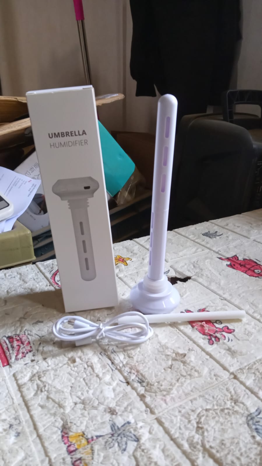 Wukusy mini portable ultrasonic humidifier for car and home, USB powered, cool mist, quiet operation, ideal for travel or bedroom use.
