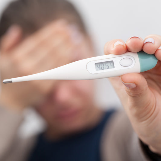 Wukusy digital thermometer for adults and children with LCD backlight display, fever detection, and protective cover.