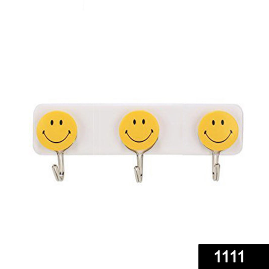 Set of three Wukusy self-adhesive smiley face wall hooks for home improvement, shown attached to a wall.