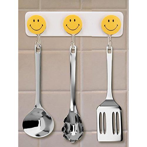 Set of three Wukusy self-adhesive smiley face wall hooks for home improvement, perfect for hanging lightweight items.