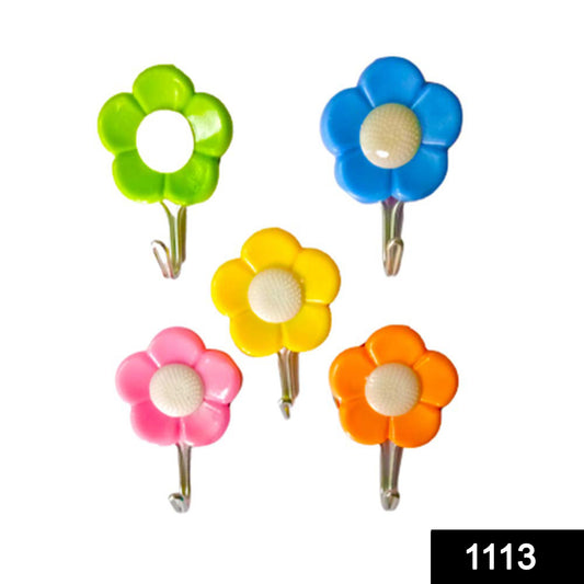 Set of 5 Wukusy plastic self-adhesive flower-shaped hooks for home improvement, designed for easy wall mounting and organization.