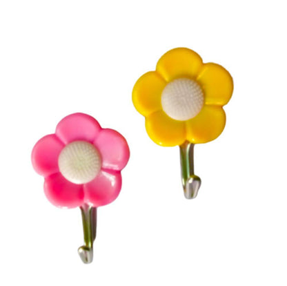 Set of 5 Wukusy plastic self-adhesive flower shape hooks for home improvement, shown mounted on a wall for hanging.