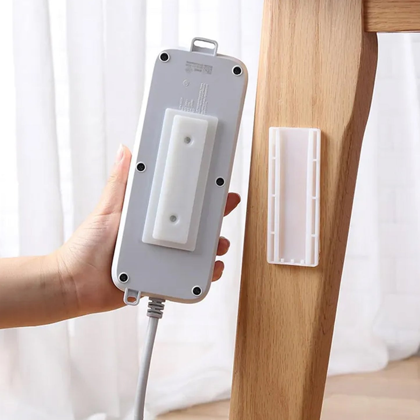 Wukusy 1208 self-adhesive wall mount plug organizer for home office, reusable, no residue, multiuse device, no holes needed.