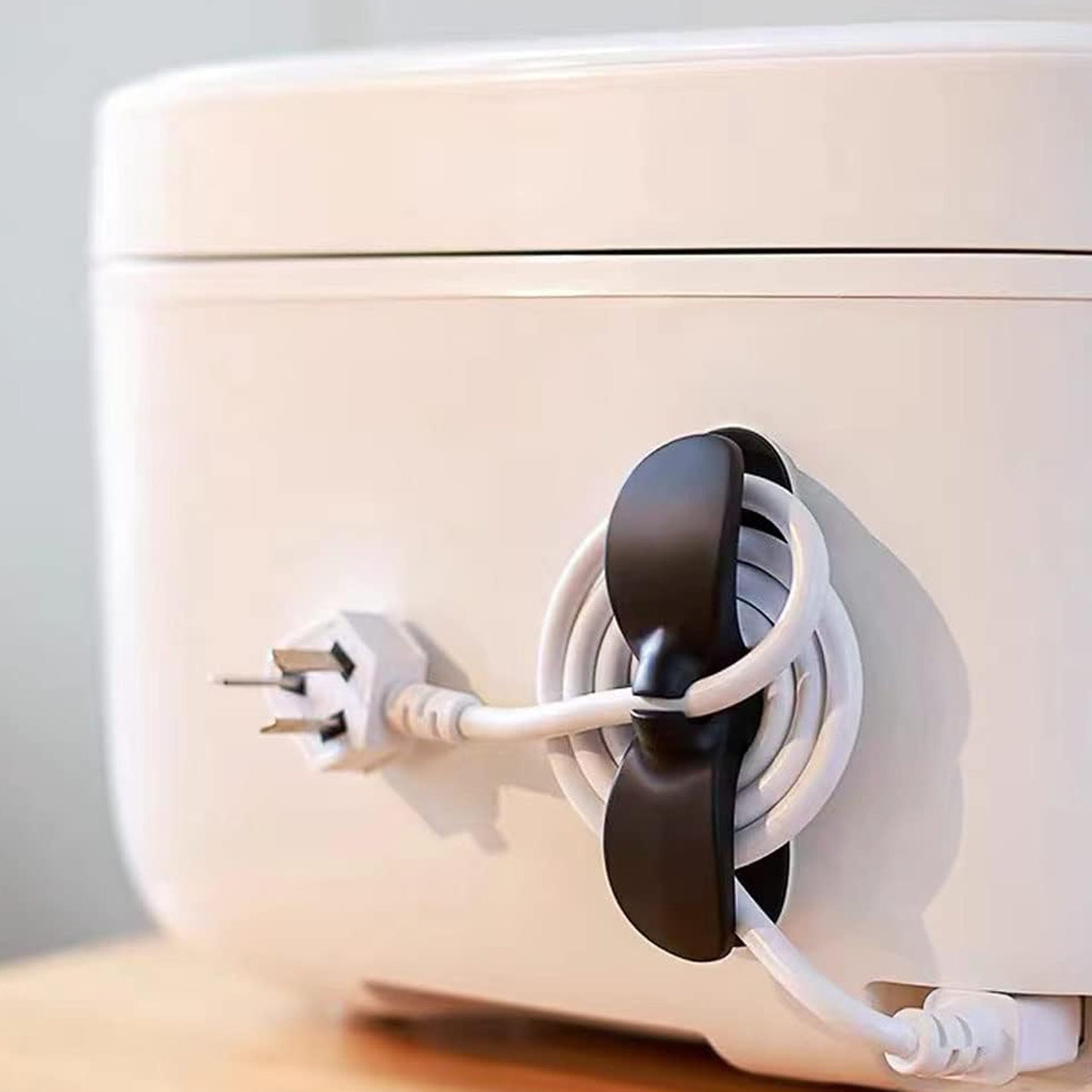 Wukusy Power Plug Holder Organizer for appliances, self-adhesive wire wrap for coffee makers and pressure cookers, 8x3 cm.