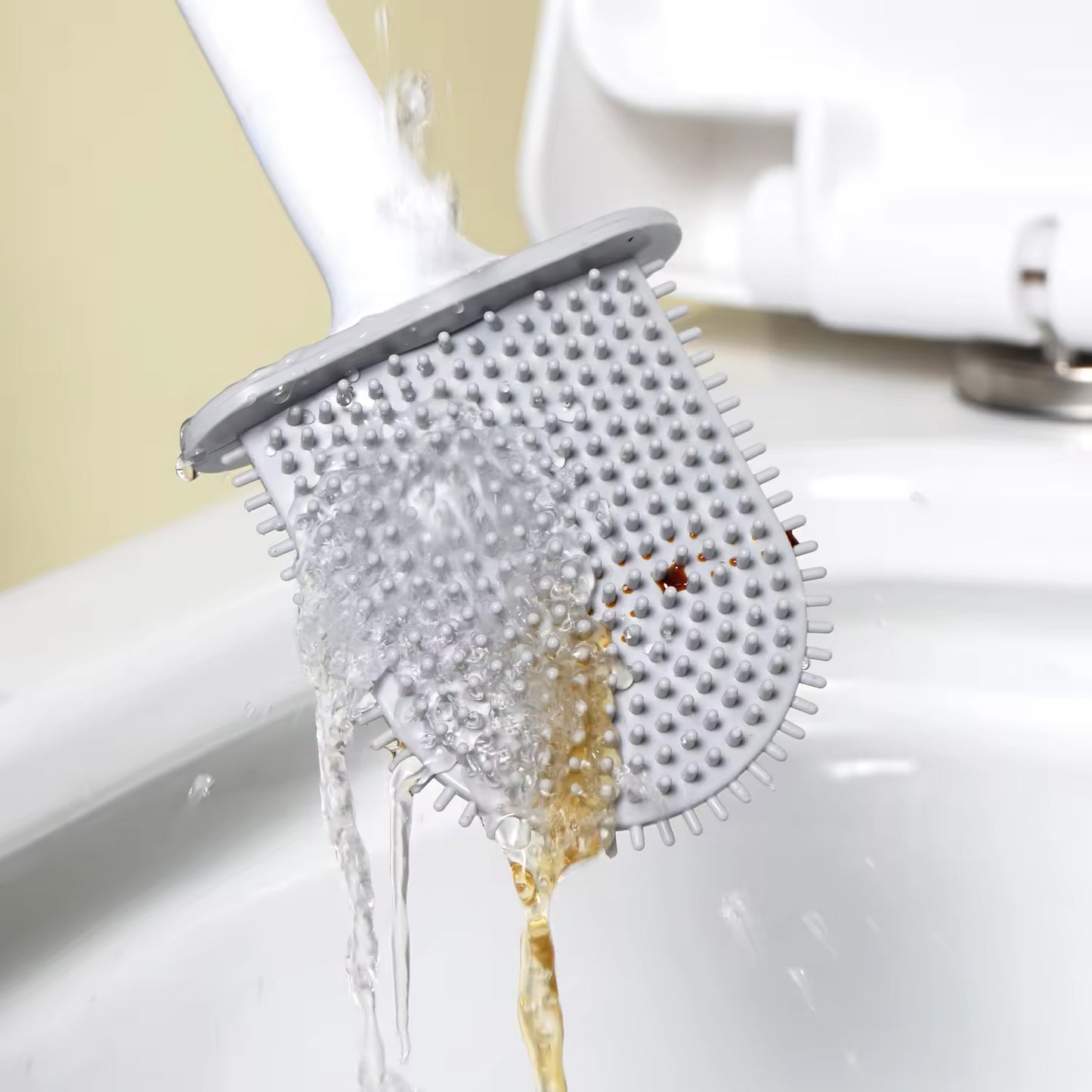 Wukusy portable silicone toilet brush with wall-mounted holder, long handle, anti-drip design, non-slip grip for effective cleaning.