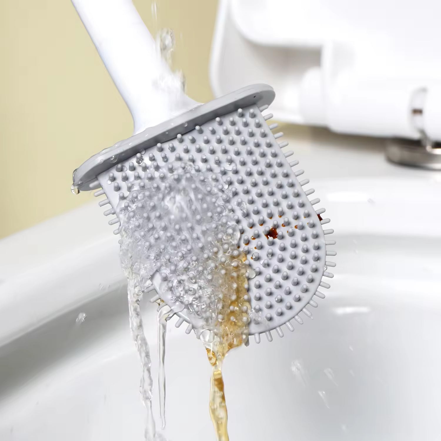Wukusy portable silicone toilet brush with wall-mounted holder, long handle, anti-drip design, non-slip grip for effective cleaning.