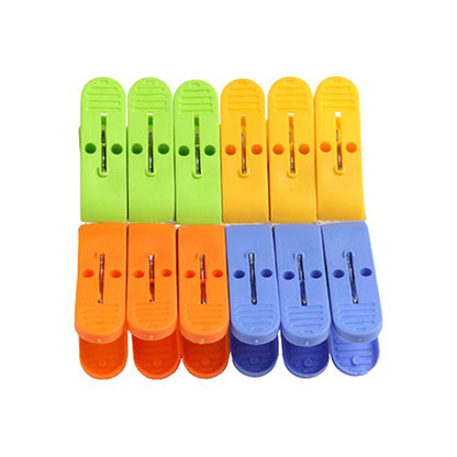 Multicolour plastic cloth clips for cloth dyeing, Wukusy brand, durable home improvement cloth clips for fabric drying or crafting.