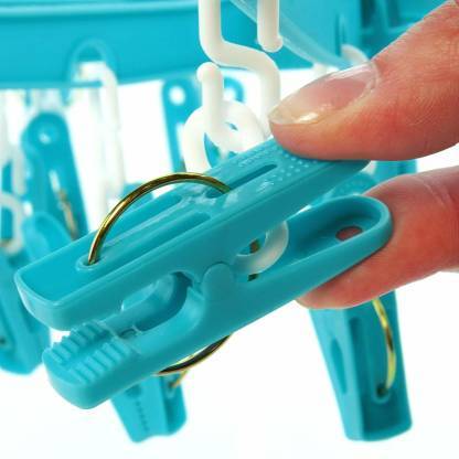 Wukusy plastic round cloth drying stand hanger with 24 multicolour clips, ideal for drying clothes indoors or outdoors.