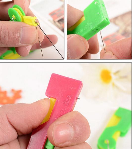 Wukusy 1381 automatic needle threading device in multicolour for home improvement, showing the compact, multicoloured tool.