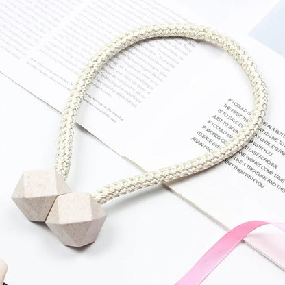 Set of two Wukusy plastic curtain tiebacks with decorative pearl accents and buckle clips for window curtain holdback and decoration.