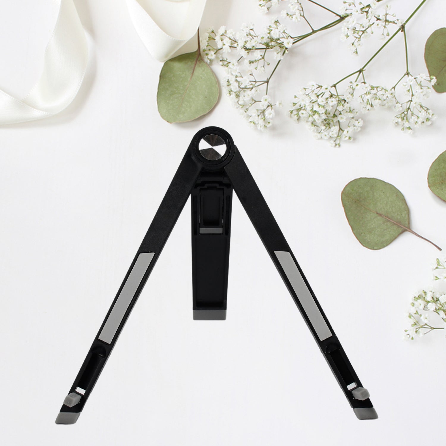 Wukusy 1430 Slim Tablet Stand, adjustable foldable mobile scaffold for home improvement, holding a tablet securely.