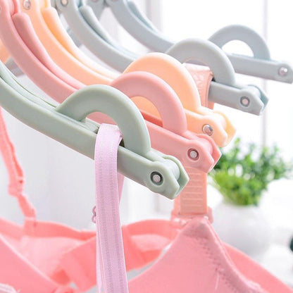 Wukusy 1432a travel folding clothes hangers with clips for scarves, suits, trousers, shirts, socks, and underwear, portable and space-saving.