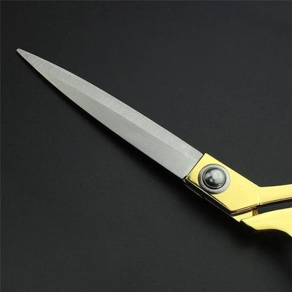 Golden Wukusy 8.5-inch stainless steel tailoring scissors for precise cloth cutting, ideal for professional home improvement tasks.