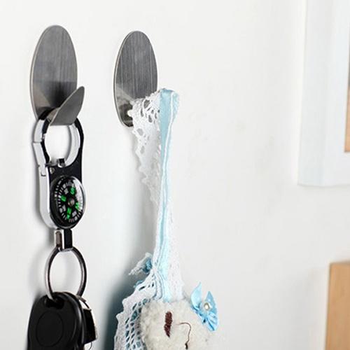 Wukusy 1660 Heavy Duty Self Adhesive Hooks, pack of 3, strong sticky hooks for home improvement tasks on walls and surfaces.