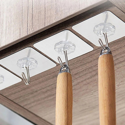 Wukusy 1689 stainless steel adhesive wall hooks, small and strong, ideal for home improvement and versatile wall mounting.