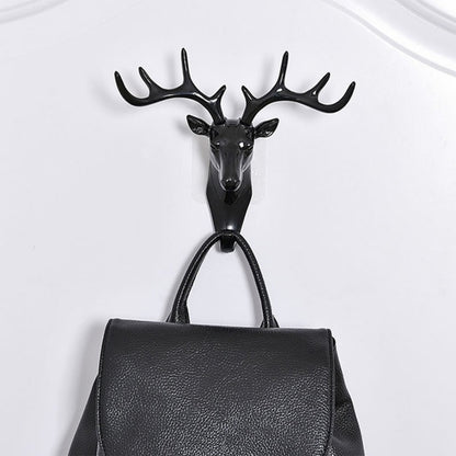 Wukusy Deer Head Self Adhesive Wall Door Hook Hanger for home organization and door decoration in a rustic style.