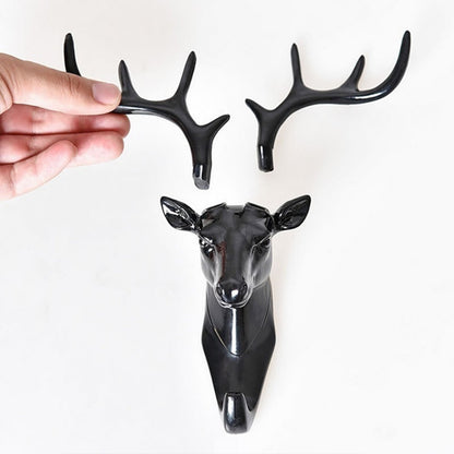 Wukusy deer head self-adhesive wall door hook hanger for home improvement, featuring a decorative deer head design.