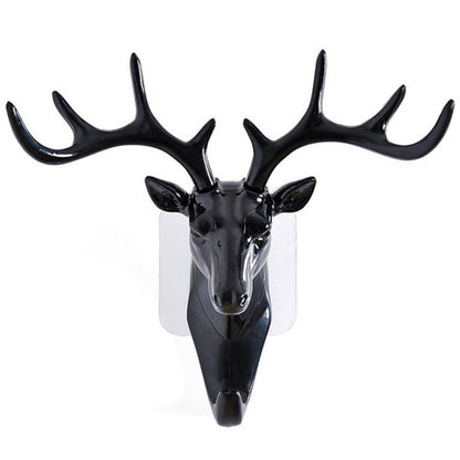 Wukusy deer head self-adhesive wall and door hook hanger for home improvement, featuring a decorative deer head design.