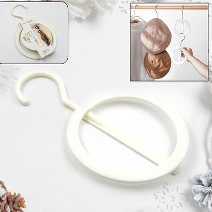 Plastic circle hanger from Wukusy for hats, towels, bags, and closet organization on walls, doors, or bathroom spaces.
