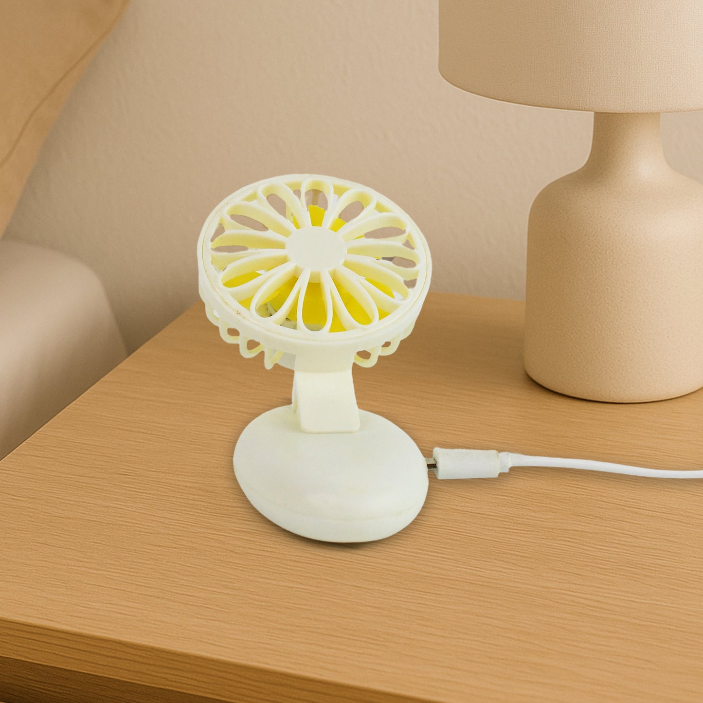 Wukusy portable mini USB handheld fan for home, office, travel, and outdoor use, rechargeable and compact design.
