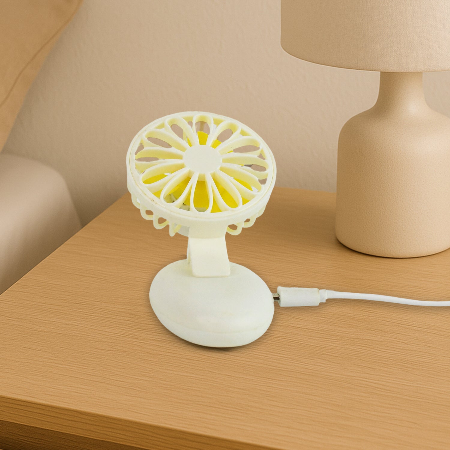 Wukusy portable mini USB handheld fan for home, office, travel, and outdoor use, rechargeable and compact design.