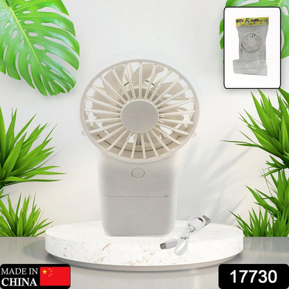 Wukusy portable handheld electric fan with 3 modes, USB rechargeable, compact mini fan for personal use and home improvement.
