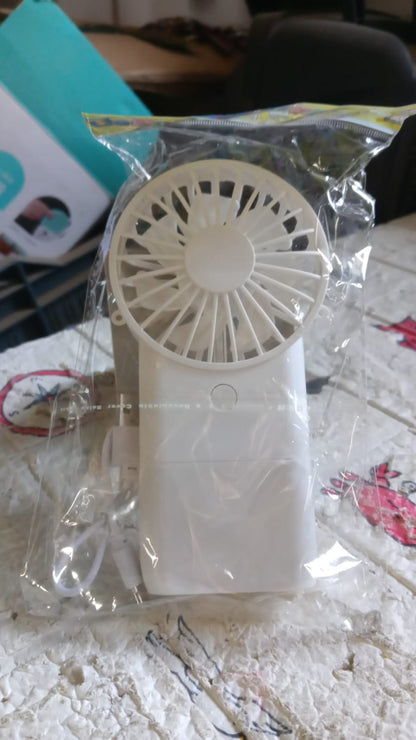 Wukusy portable handheld electric fan with 3 modes, USB rechargeable, compact mini fan for personal use and students.