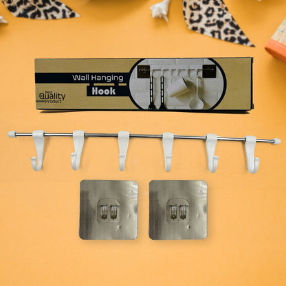 Wukusy stainless steel utensil hanger rail with 6 plastic hooks, nail-free wall mount, and 2 magic stickers for kitchen organization.