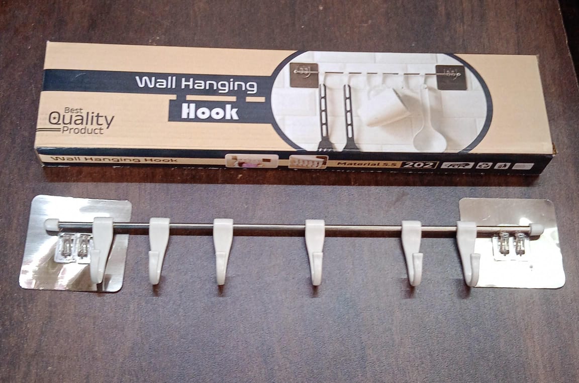 Wukusy stainless steel utensil hanger rail with 6 plastic hooks, nail-free wall mount with magic stickers for kitchen organization.