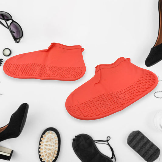 Red waterproof silicone boot shoe covers by Wukusy with non-slip, anti-skid design, foldable and reusable for rain protection.