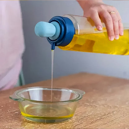 Wukusy 2-in-1 transparent oil dispenser with silicone oil dropper nozzle and brush, 1-liter capacity for home improvement tasks.